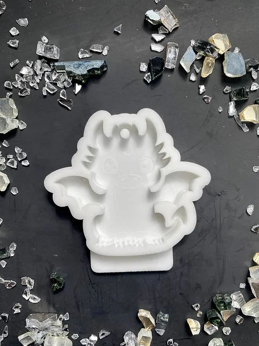 Model №289 Silicone mold for Christmas toy "Dragon sitting"